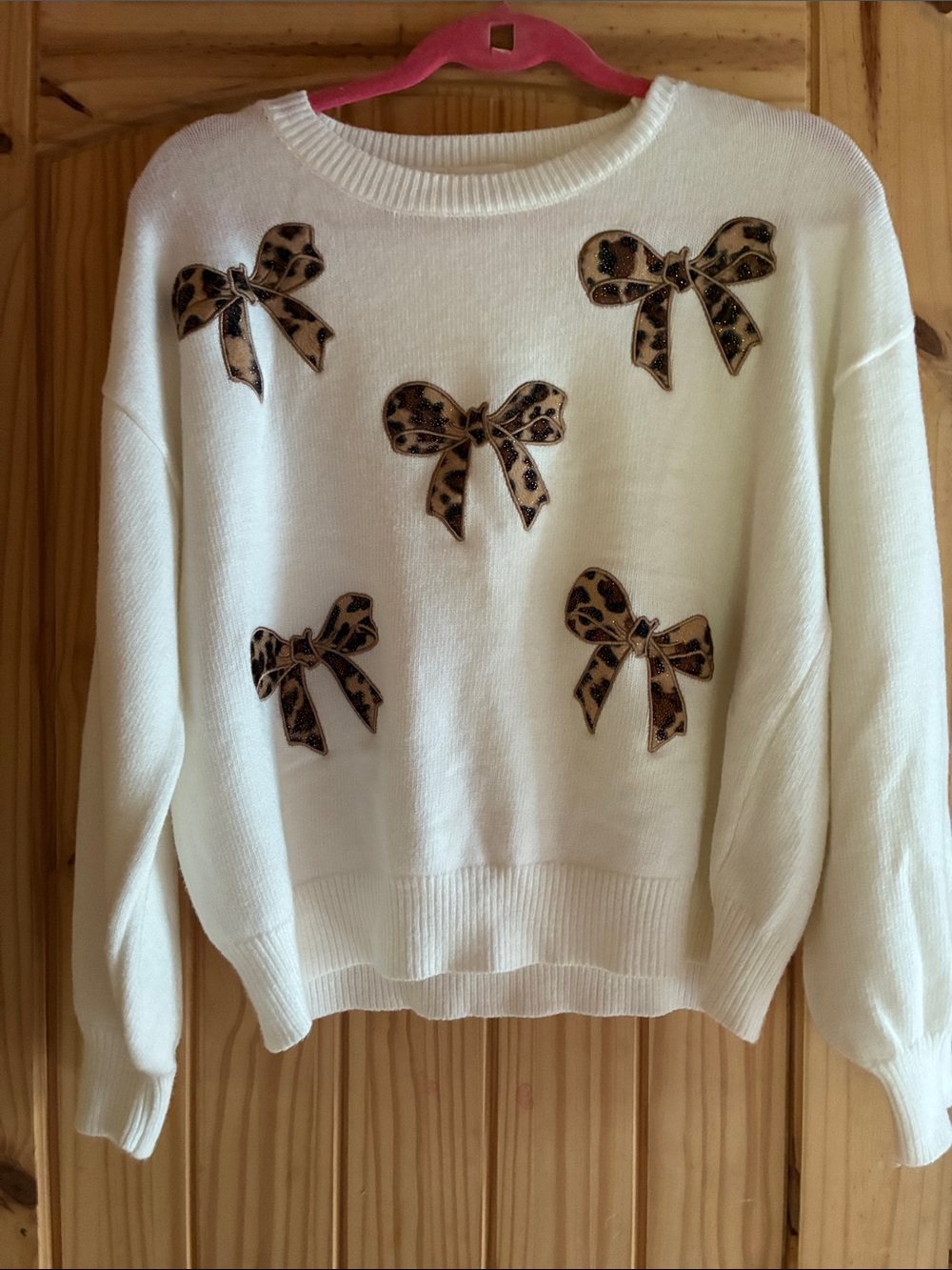 ADORA Cream Sweater with Leopard-Print Bow Appliqués